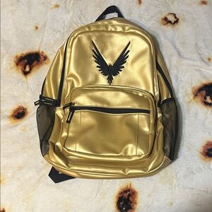 Gold Backpack with Black Accents